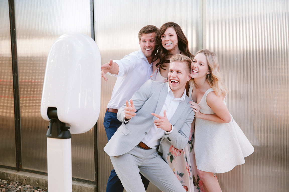 Guests laughing at social booth